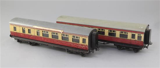 A pair of BR 1st class coaches, nos.9272 (Bassett Lowke) and 26233, in blood and custard